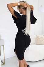 Knälång cocktail klänning V-ringad volangärm svart